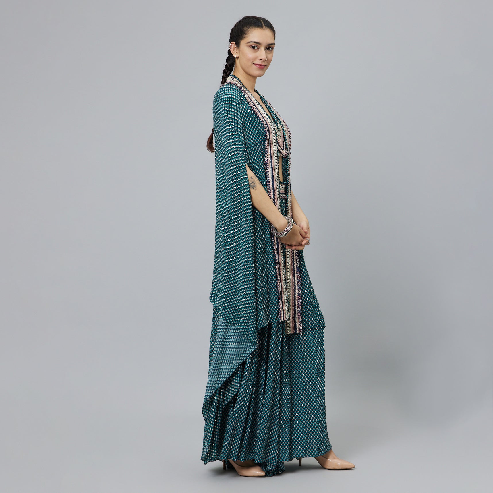 TEXTURED CROP TOP TEAMED WITH EMBELLISHED BLUE BUTTI PRINT BOX PLEAT PANTS HIGHLIGHTED CAPE
