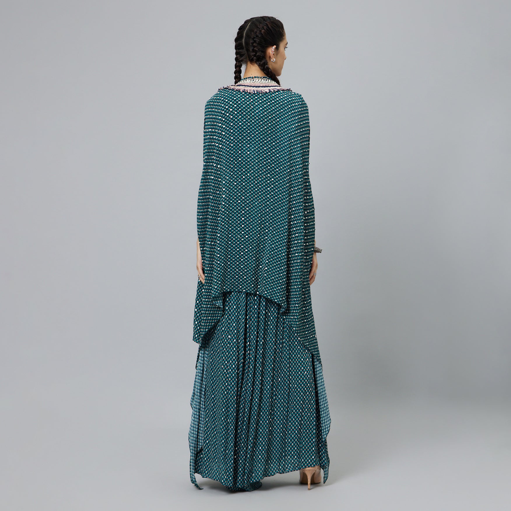 TEXTURED CROP TOP TEAMED WITH EMBELLISHED BLUE BUTTI PRINT BOX PLEAT PANTS HIGHLIGHTED CAPE