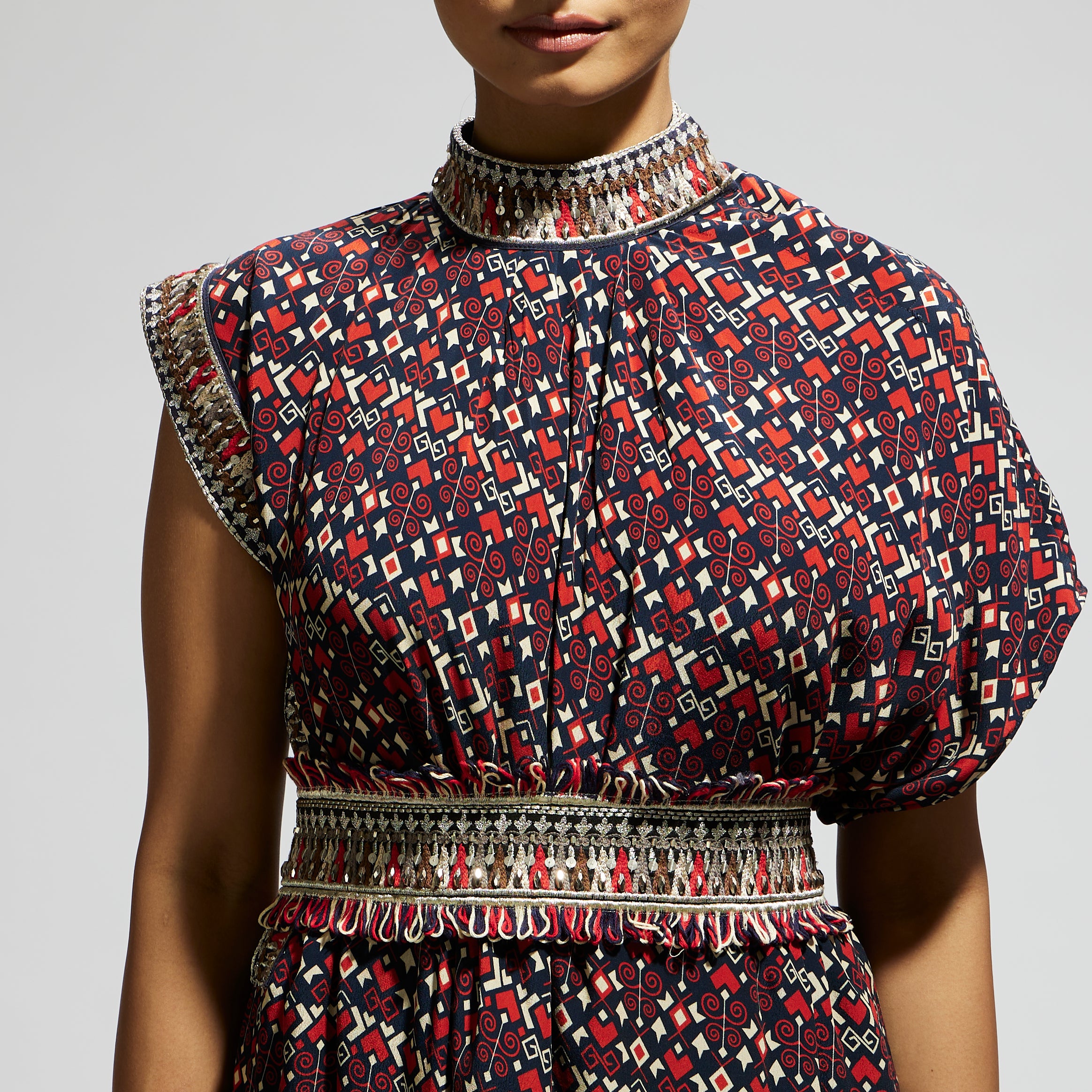BLUE GEO PRINTED COWL DRESS TEAMED WITH A BELT
