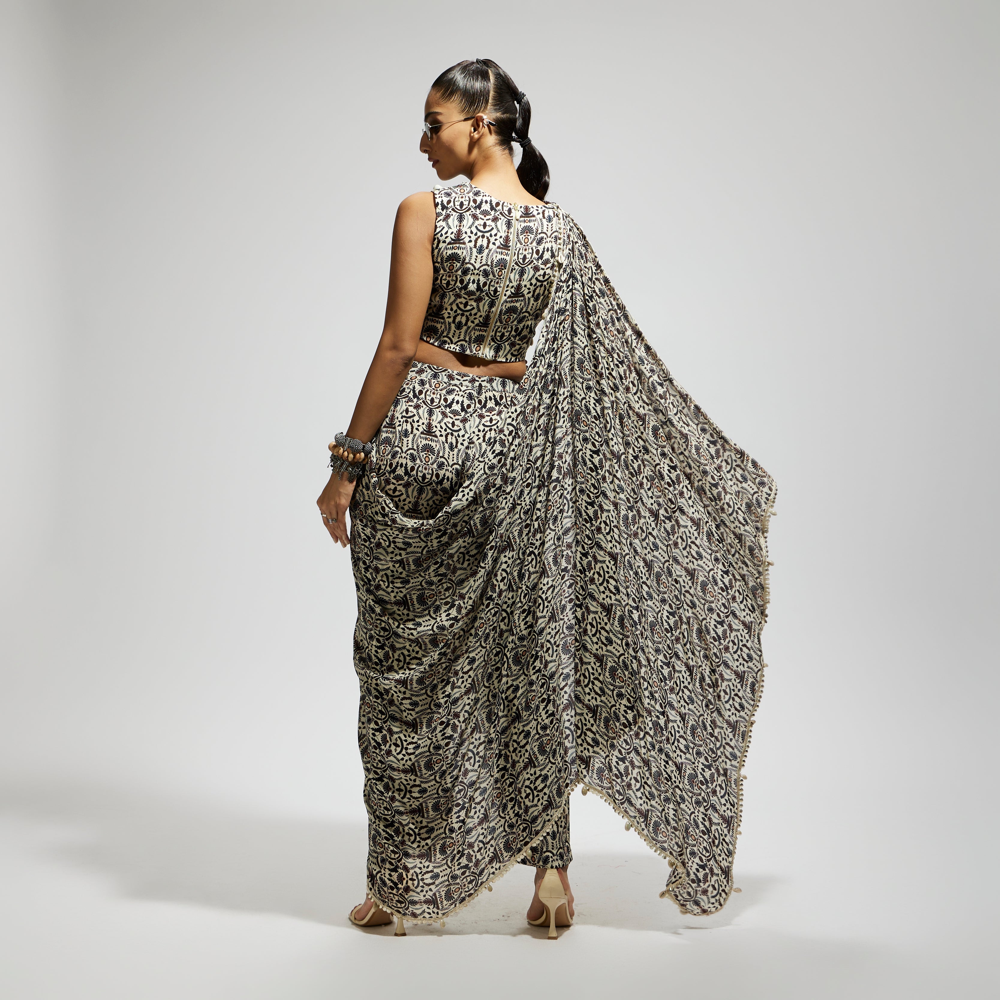 SAMSARA: WHITE JAAL PRINT CROP TOP WITH ATTACHED DRAPE WITH PANTS