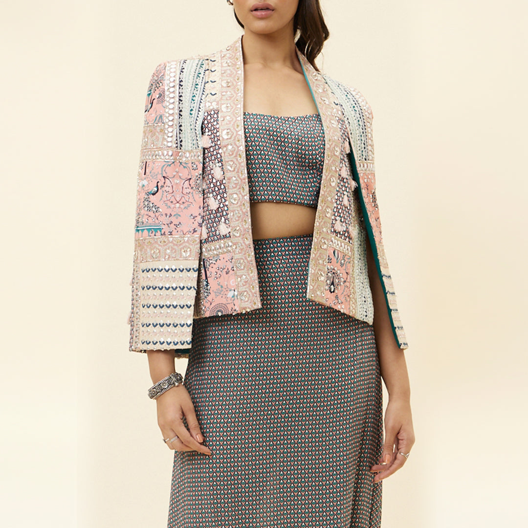 PINK MOR JAAL BUTTI PRINT DRAPE SKIRT WITH BUSTIER AND PATCHWORK NOOR CAPE JACKET