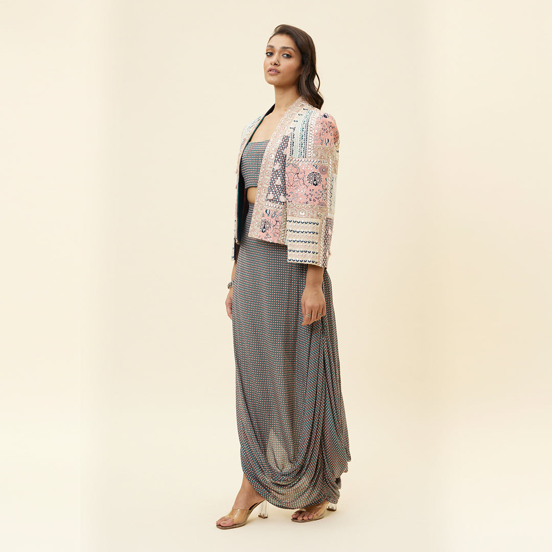 PINK MOR JAAL BUTTI PRINT DRAPE SKIRT WITH BUSTIER AND PATCHWORK NOOR CAPE JACKET