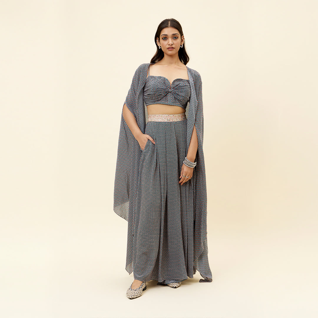 PINK BUTTI PRINT BOX PLEATED PANTS WITH BIKINI BUSTIER AND CAPE