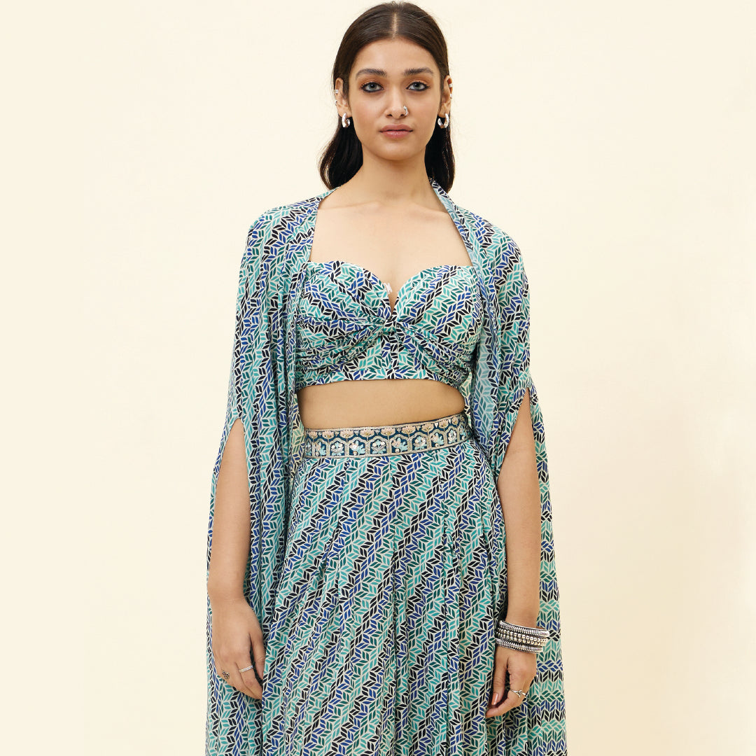 BEIGE LEAF PRINT BOX PLEATED PANTS WITH BIKINI BUSTIER AND CAPE