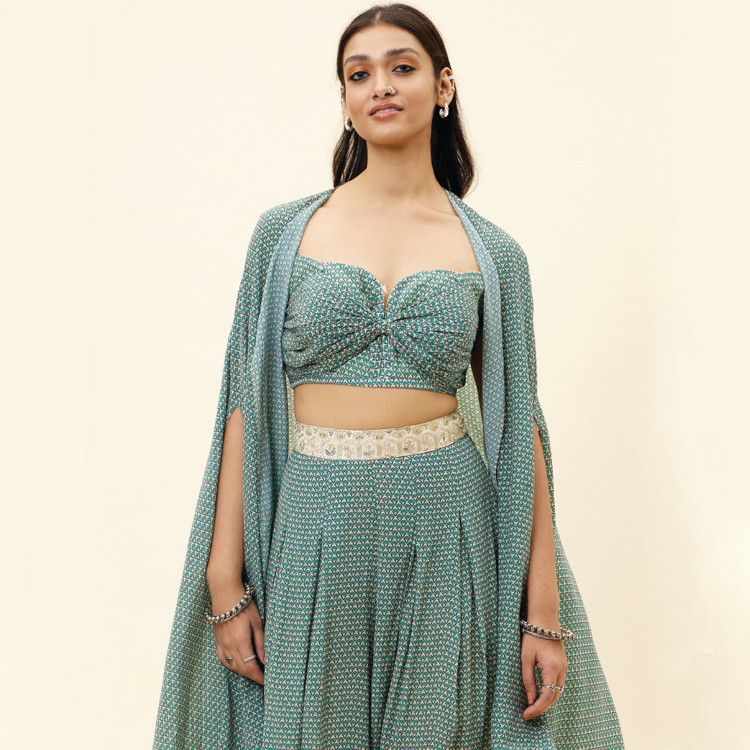 BEIGE BUTTI PRINT BOX PLEATED PANTS WITH BIKINI BUSTIER AND CAPE