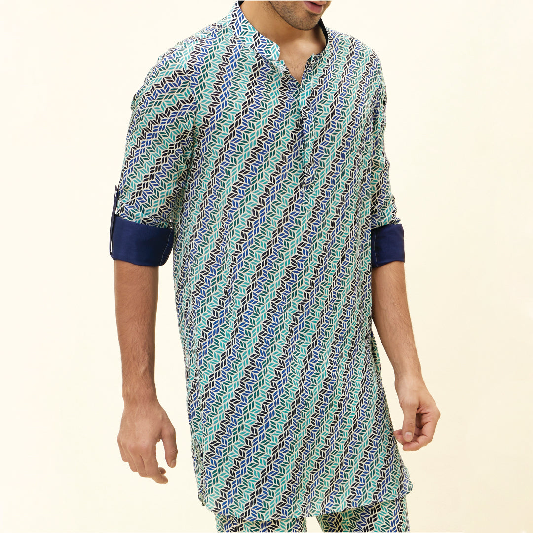 BEIGE LEAF PRINT SHORT SHIRT STYLE KURTA WITH ROLLED UP SLEEVES WITH BEIGE LEAF PRINT PANTS