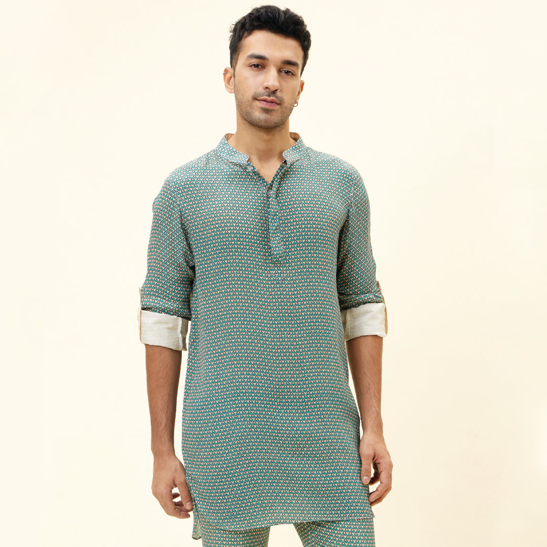 BEIGE BUTTI PRINT SHORT SHIRT STYLE KURTA WITH ROLLED UP SLEEVES WITH BEIGE BUTTI PRINT PANTS