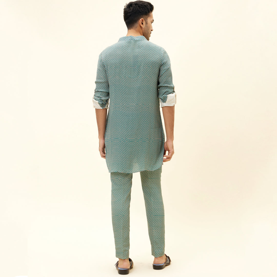 BEIGE BUTTI PRINT SHORT SHIRT STYLE KURTA WITH ROLLED UP SLEEVES WITH BEIGE BUTTI PRINT PANTS