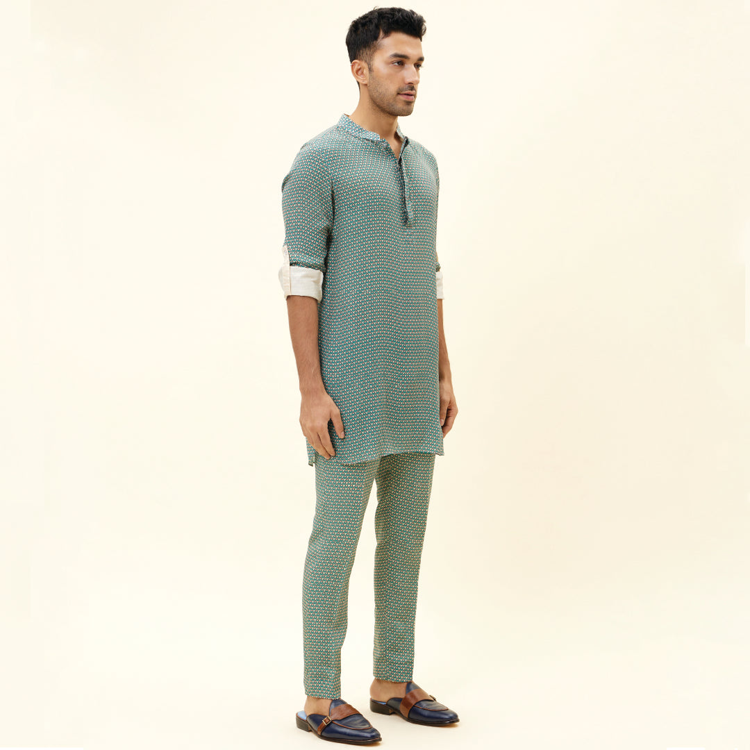 BEIGE BUTTI PRINT SHORT SHIRT STYLE KURTA WITH ROLLED UP SLEEVES WITH BEIGE BUTTI PRINT PANTS