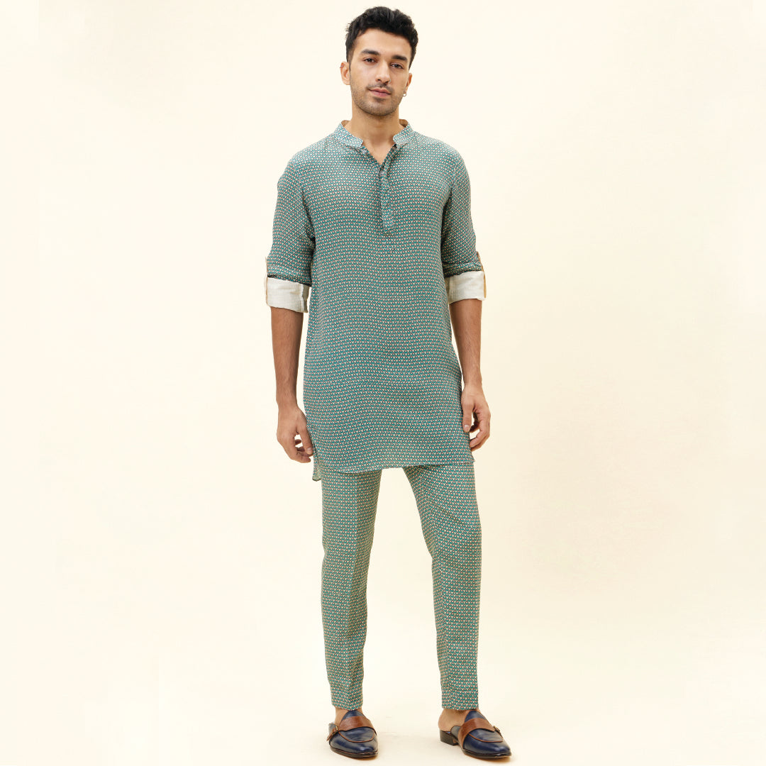 BEIGE BUTTI PRINT SHORT SHIRT STYLE KURTA WITH ROLLED UP SLEEVES WITH BEIGE BUTTI PRINT PANTS