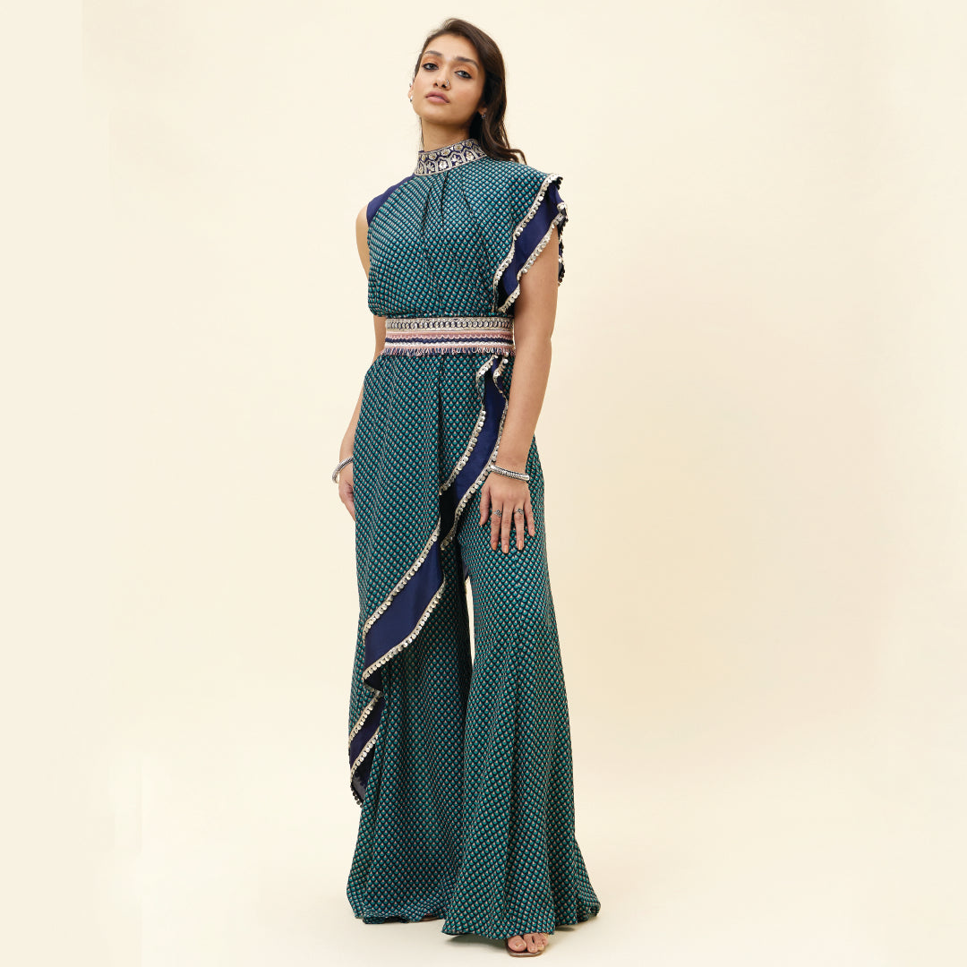 BLUE CROP TOP WITH BLUE BUTTI PRINT DRAPE AND BLUE SOLID PLAIN SILK DRAPE WITH BLUE BUTTI PRINT SHARARA PANTS AND EMB BELT