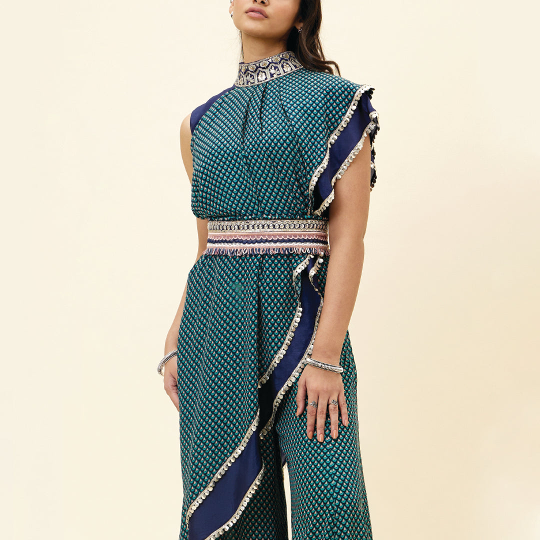 BLUE CROP TOP WITH BLUE BUTTI PRINT DRAPE AND BLUE SOLID PLAIN SILK DRAPE WITH BLUE BUTTI PRINT SHARARA PANTS AND EMB BELT
