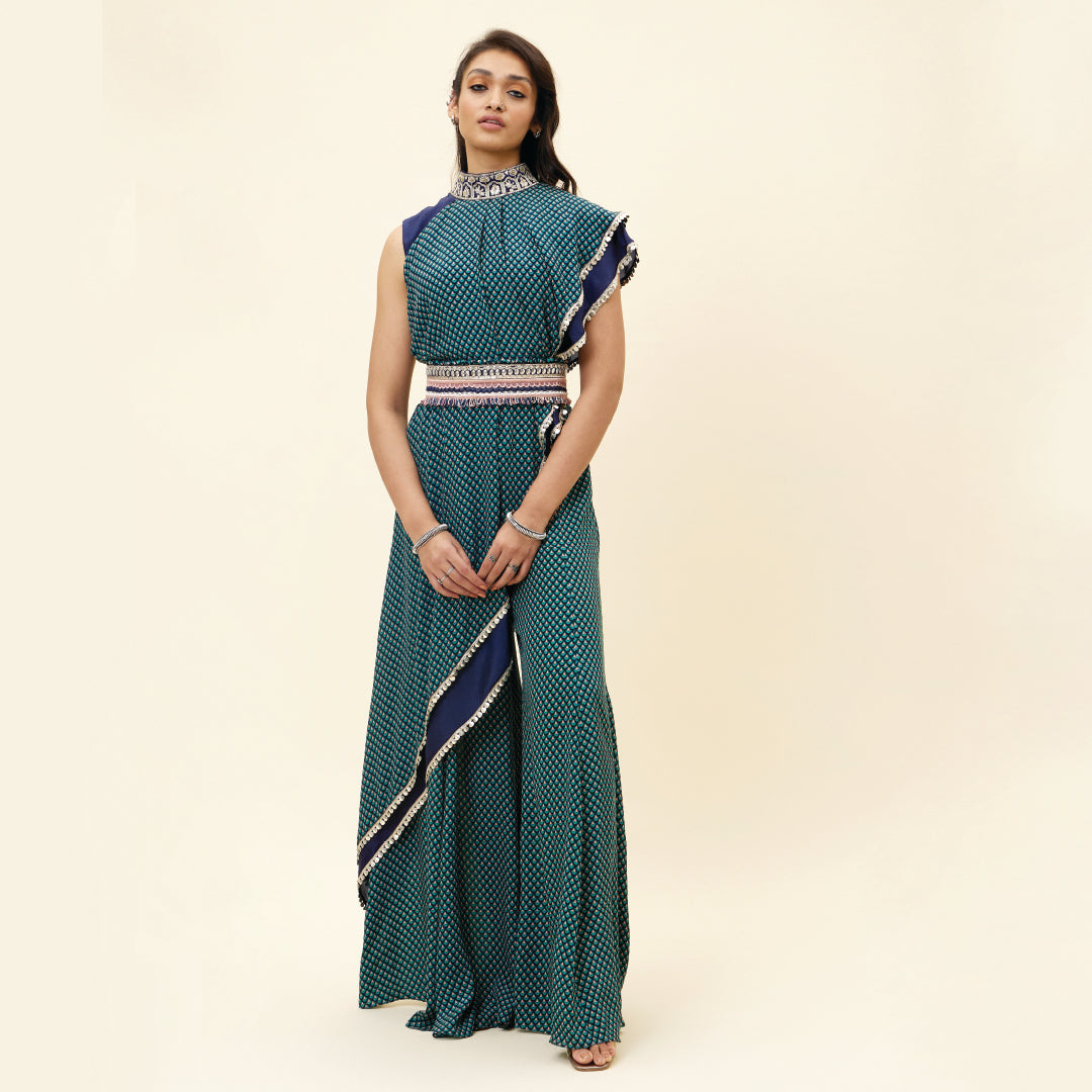 BLUE CROP TOP WITH BLUE BUTTI PRINT DRAPE AND BLUE SOLID PLAIN SILK DRAPE WITH BLUE BUTTI PRINT SHARARA PANTS AND EMB BELT