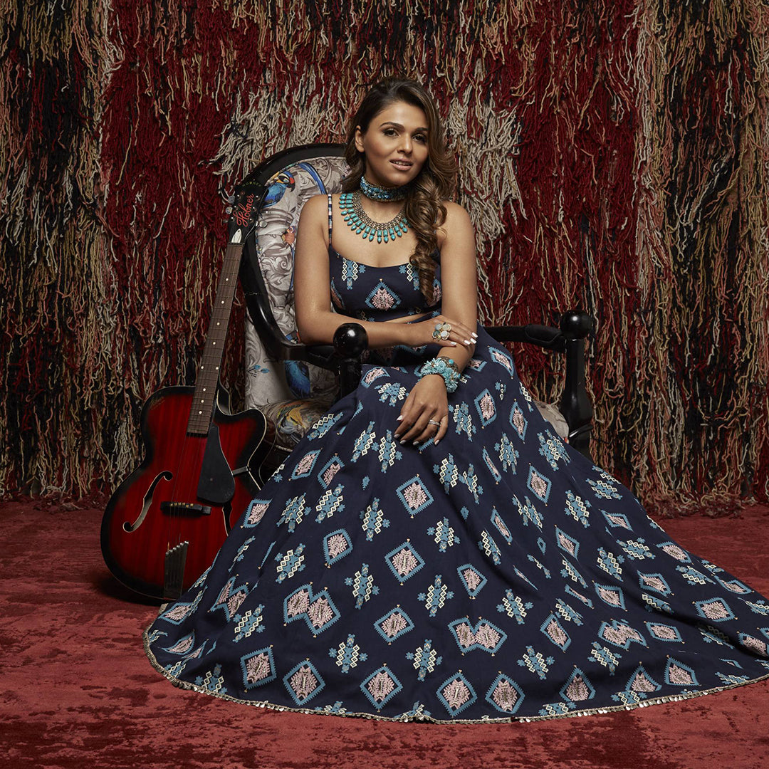 Dark blue printed denim bustier paired with printed lehenga