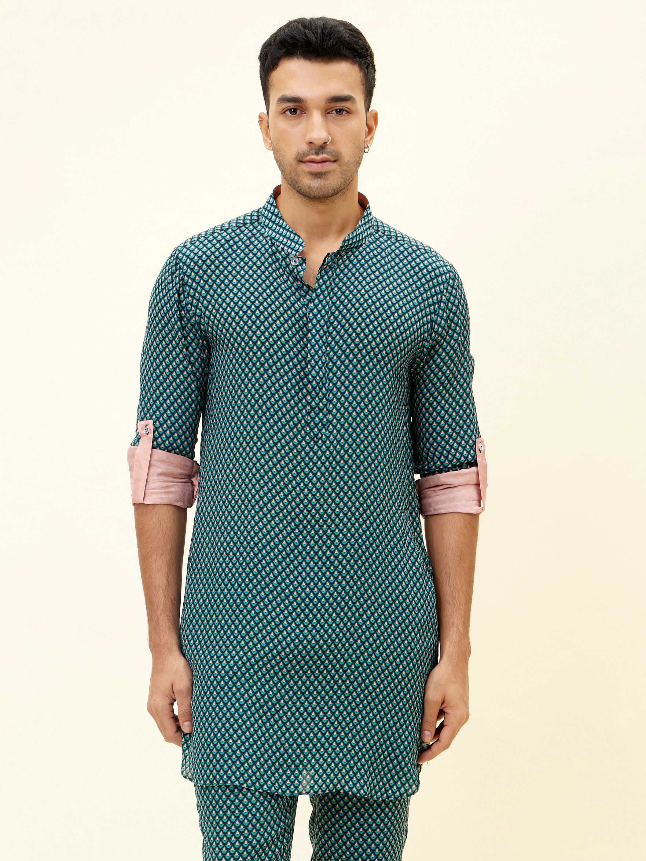 BLUE BUTTI PRINT SHORT SHIRT STYLE KURTA WITH ROLLED UP SLEEVES