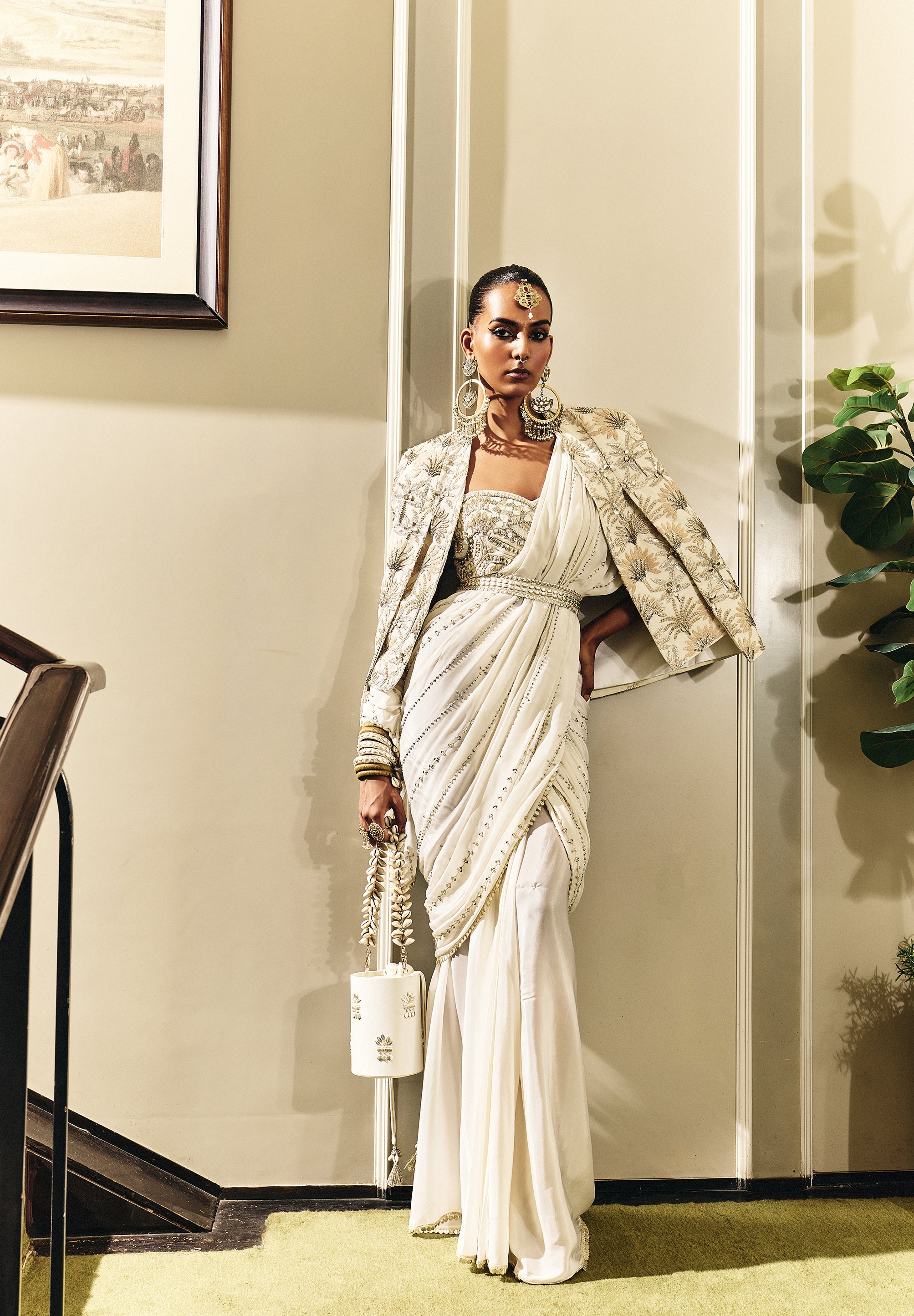 GUL IVORY DRAPED SAREE SET WITH EMBELLISHED BUSTIER AND CAPE JACKET WITH EMBELLISHED BELT