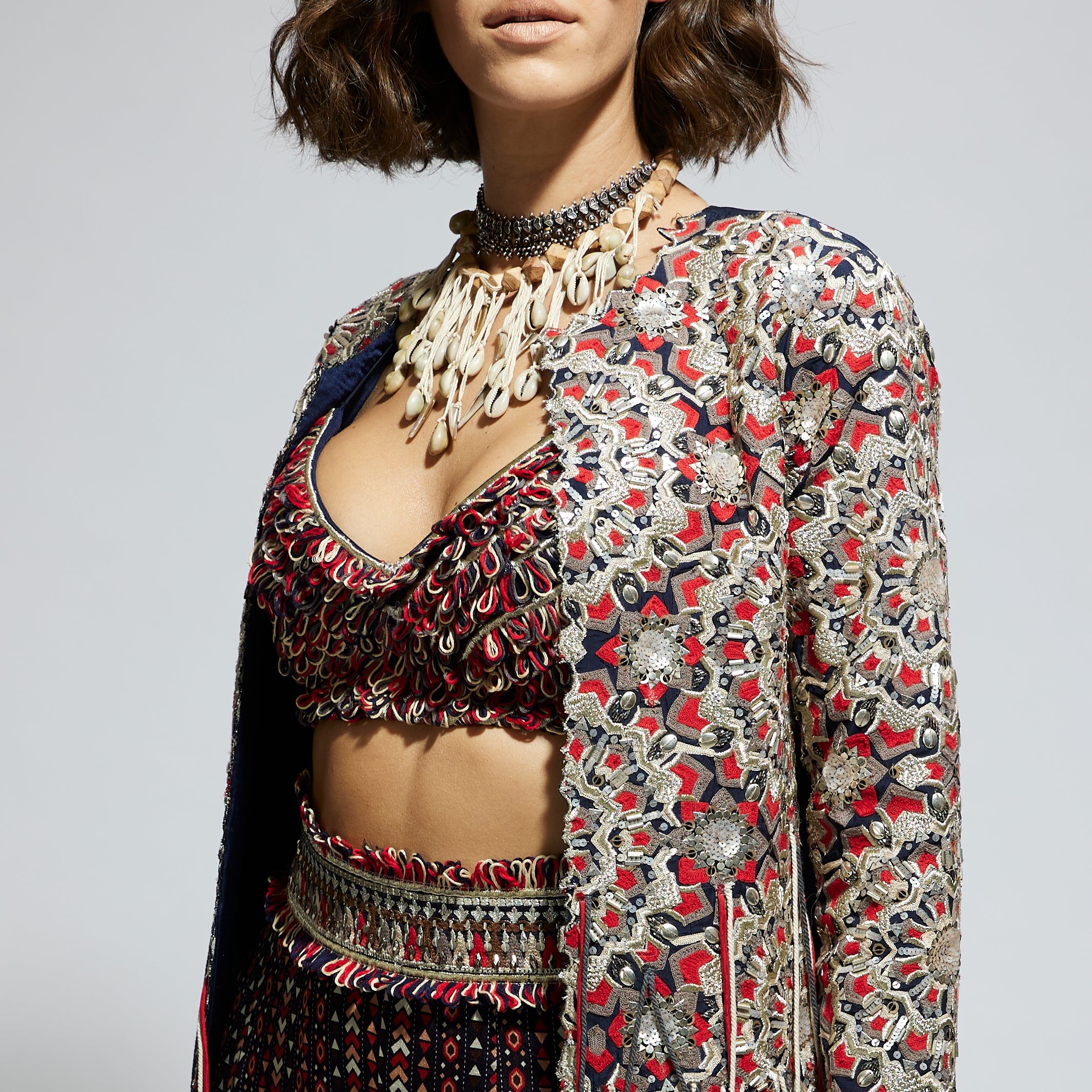 BLUE THREADWORK EMBELLISHED JACKET PAIRED WITH TEXTURED BUSTIER AND BLUE PRINTED SHARARA PANTS