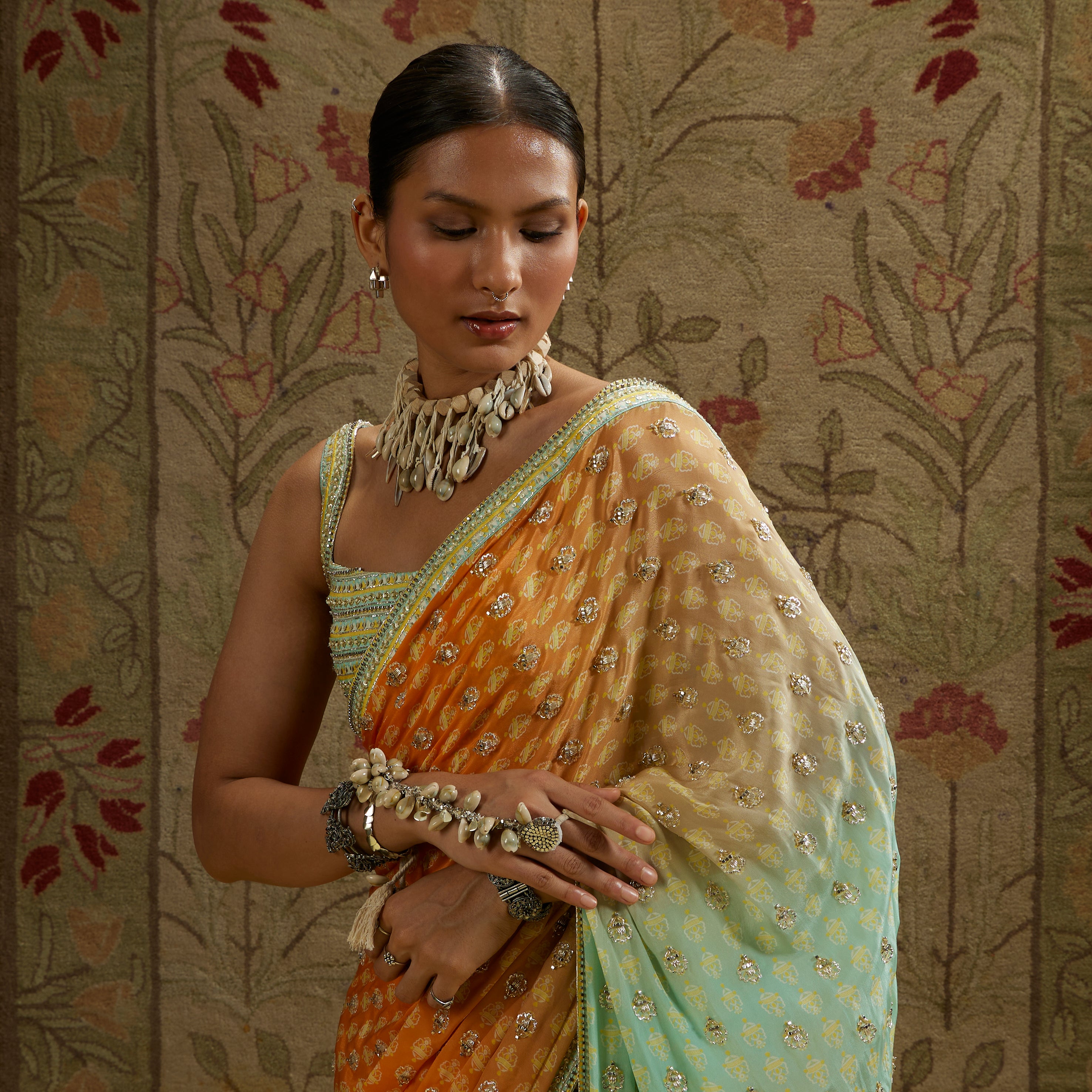 TEAL BLUE ORANGZA EMBELLISHED SAREE PAIRED WITH EMBELLISHED BLOUSE