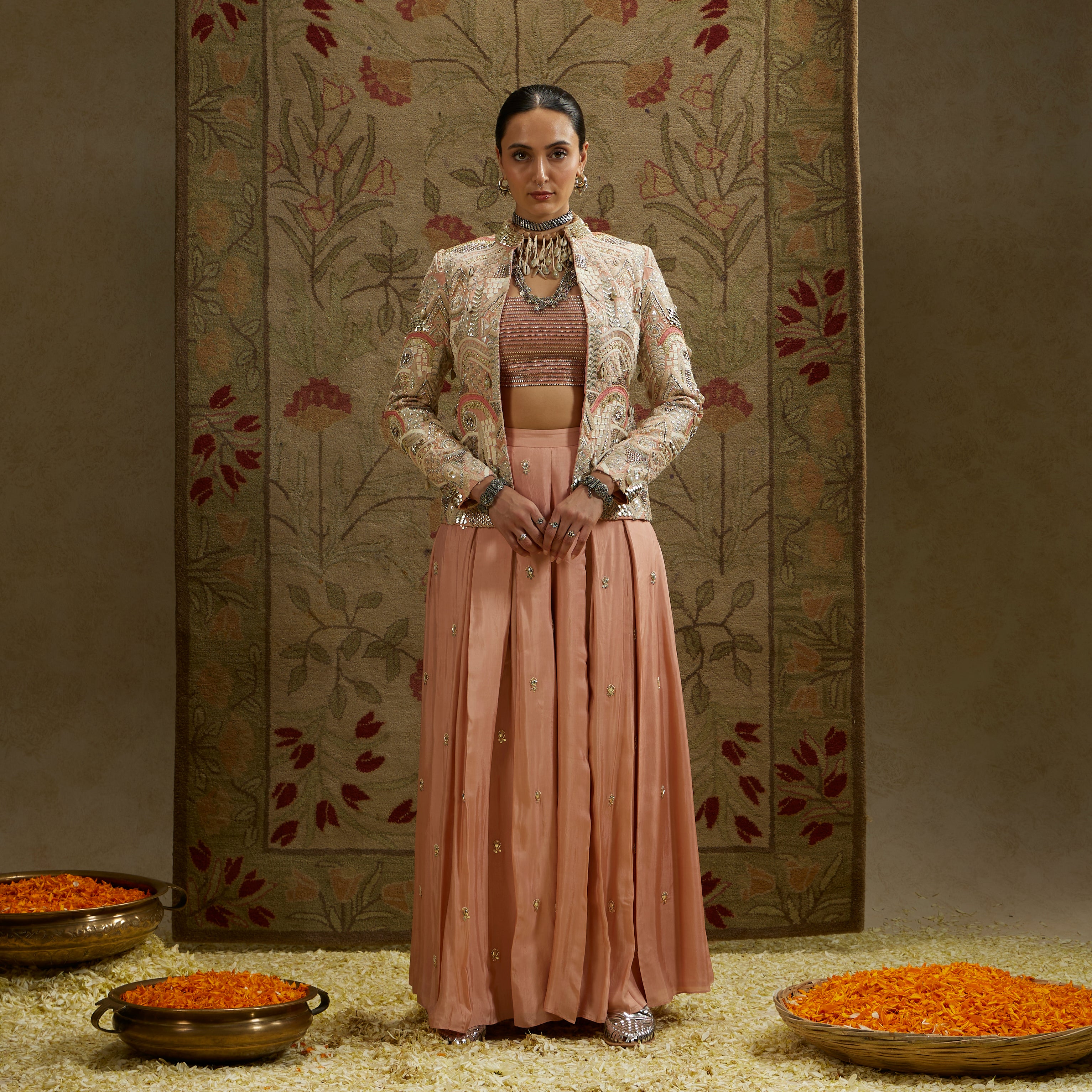 PINK EMBELLSIHED JACKET PAIRED WITH BUSTIER AND EMBELLISHED PLEATED PANTS