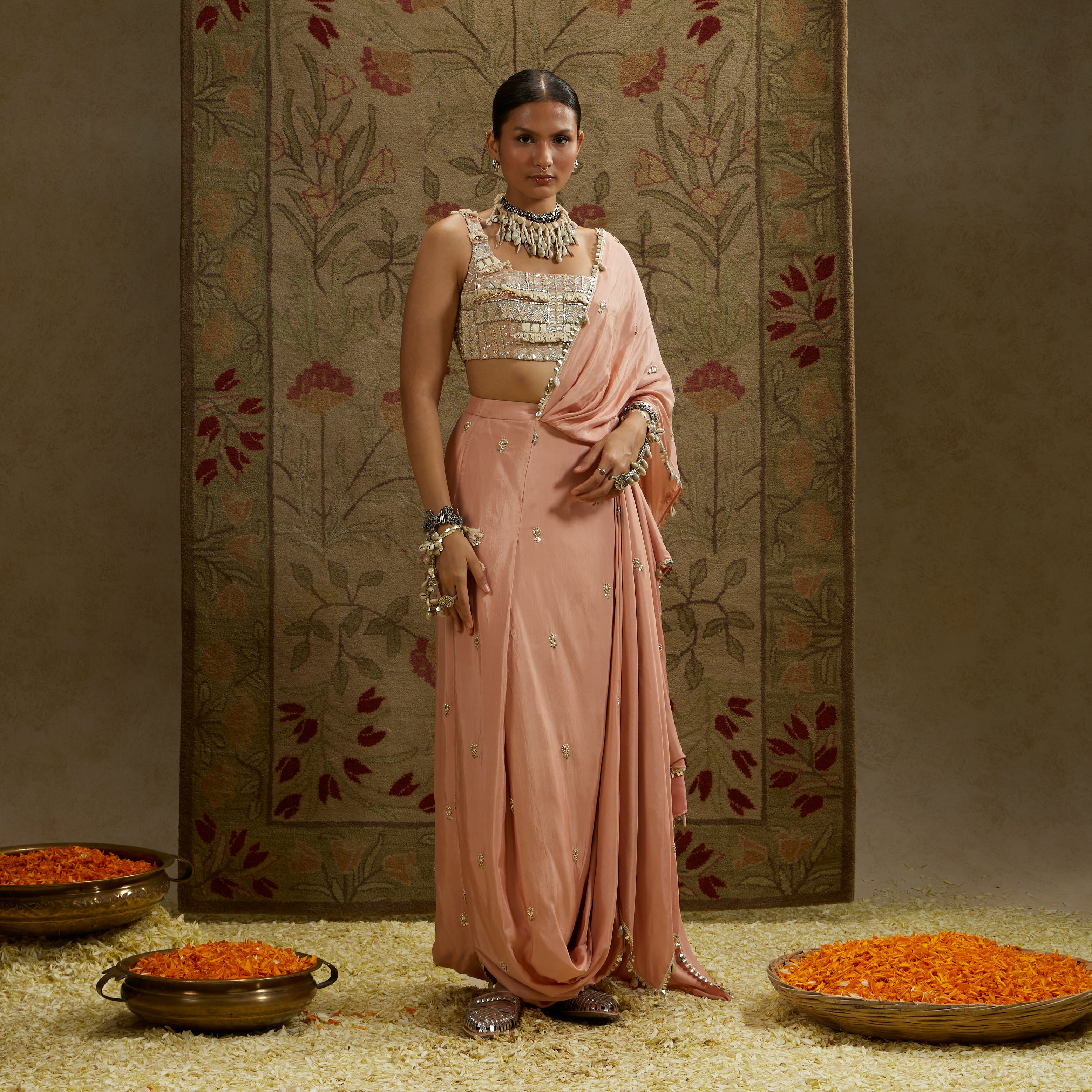 PINK EMBELLISHED SAREE PAIRED WITH EMBELLISHED BUSTIER AND DRAPED SKIRT