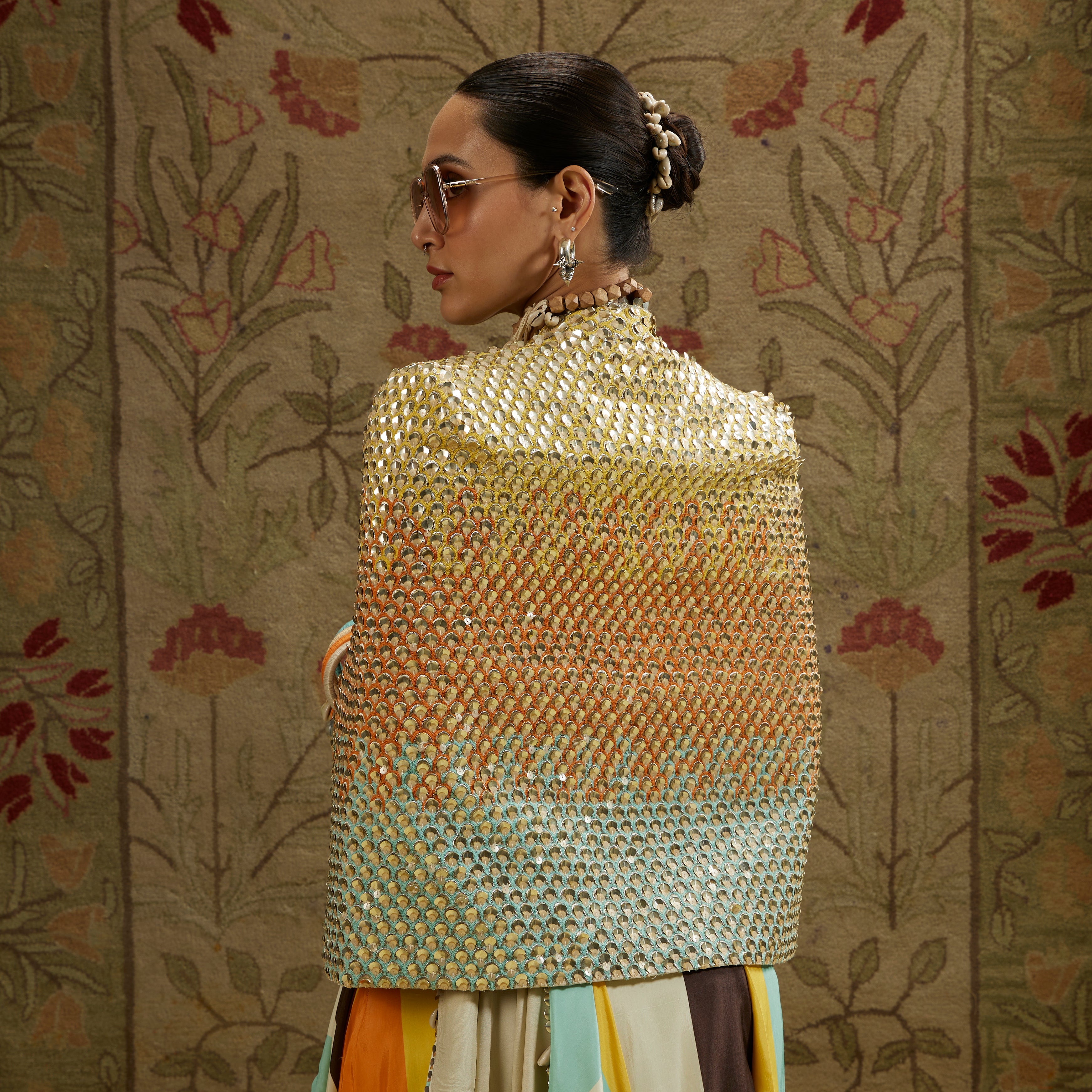 MULTI COLORED METALLIC NOOR JACKET PAIRED WITH STRIPE PRINTED BUSTIER AND SKIRT