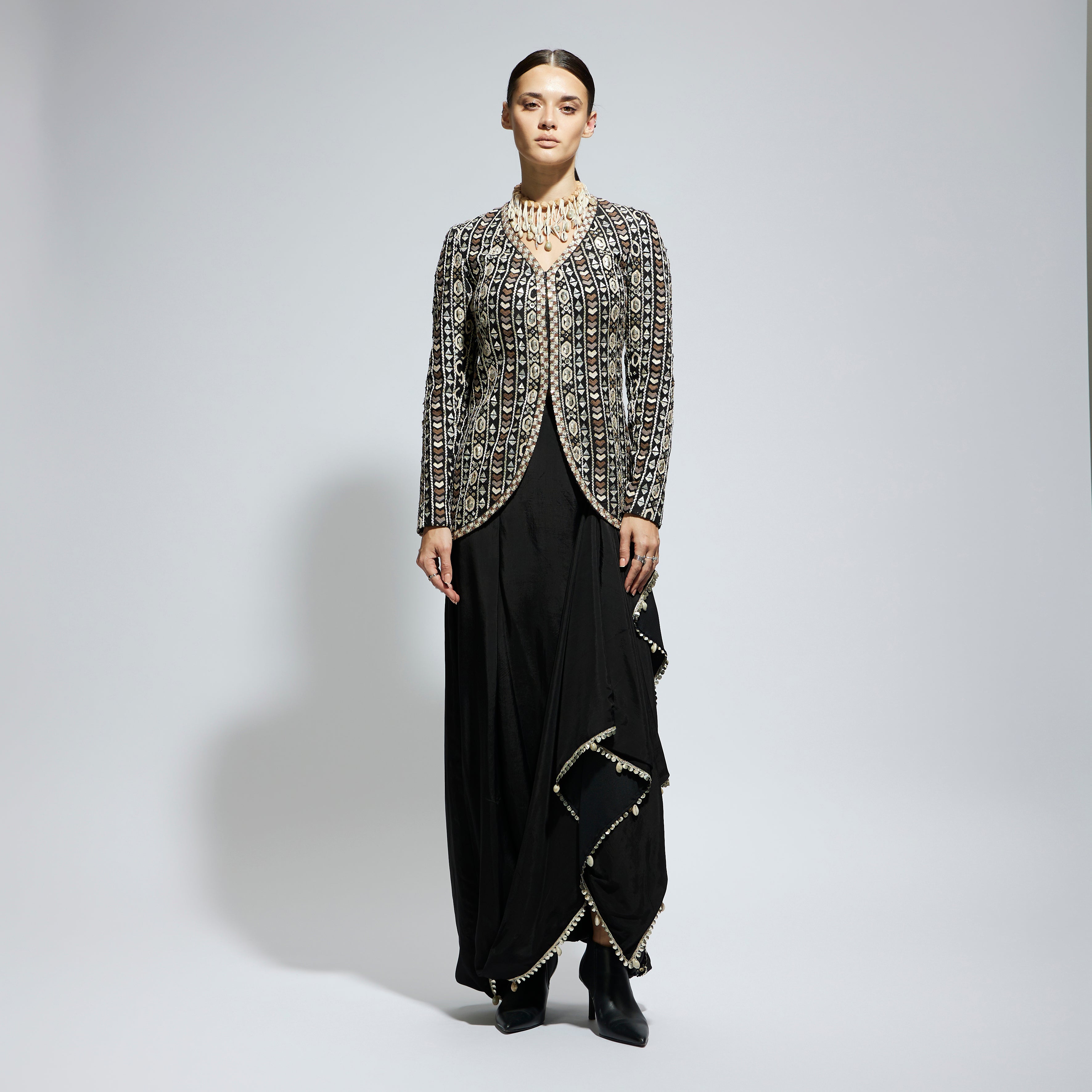 SAMSARA: BLACK EMBELLISHED JACKET PAIRED WITH DRAPE SKIRT