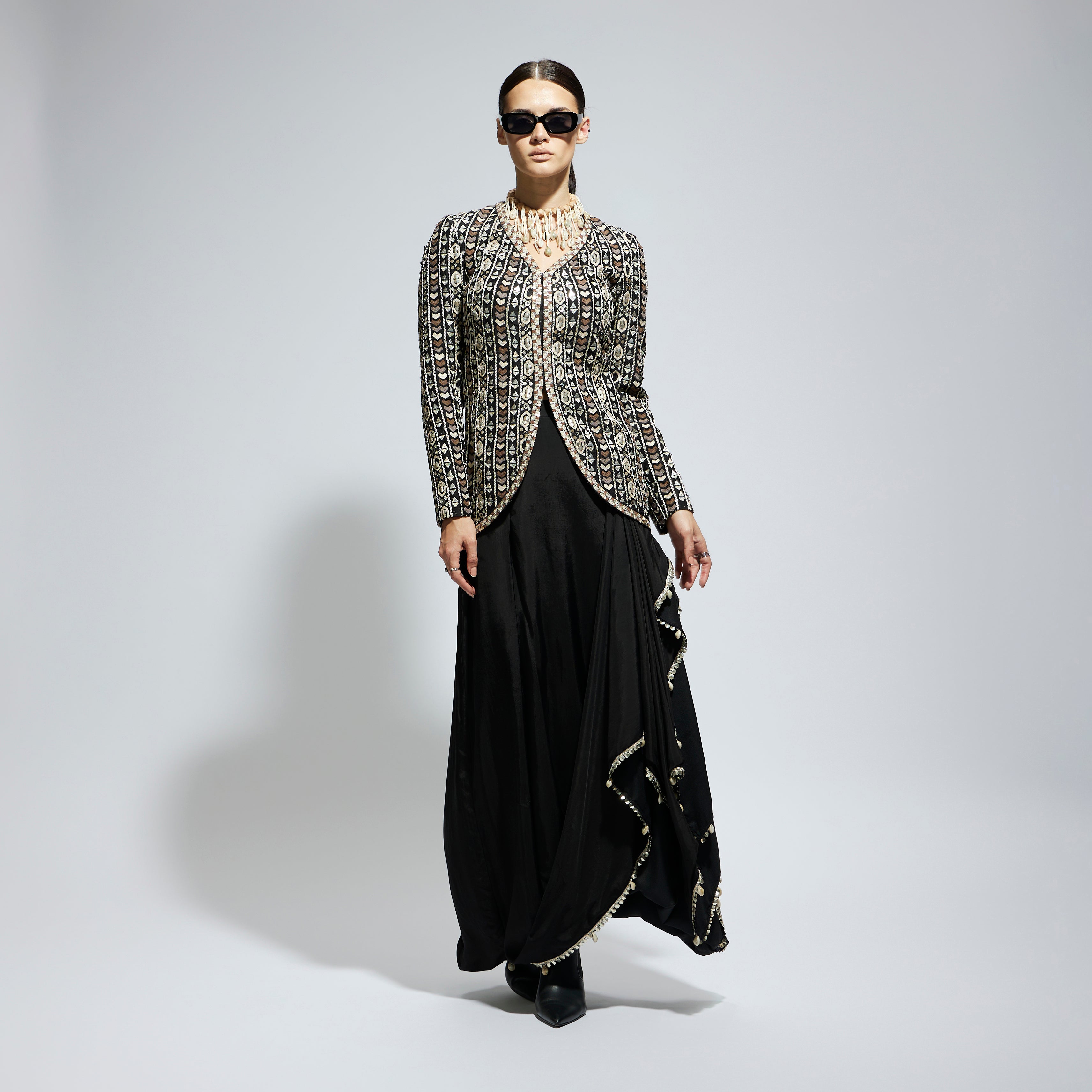 SAMSARA: BLACK EMBELLISHED JACKET PAIRED WITH DRAPE SKIRT