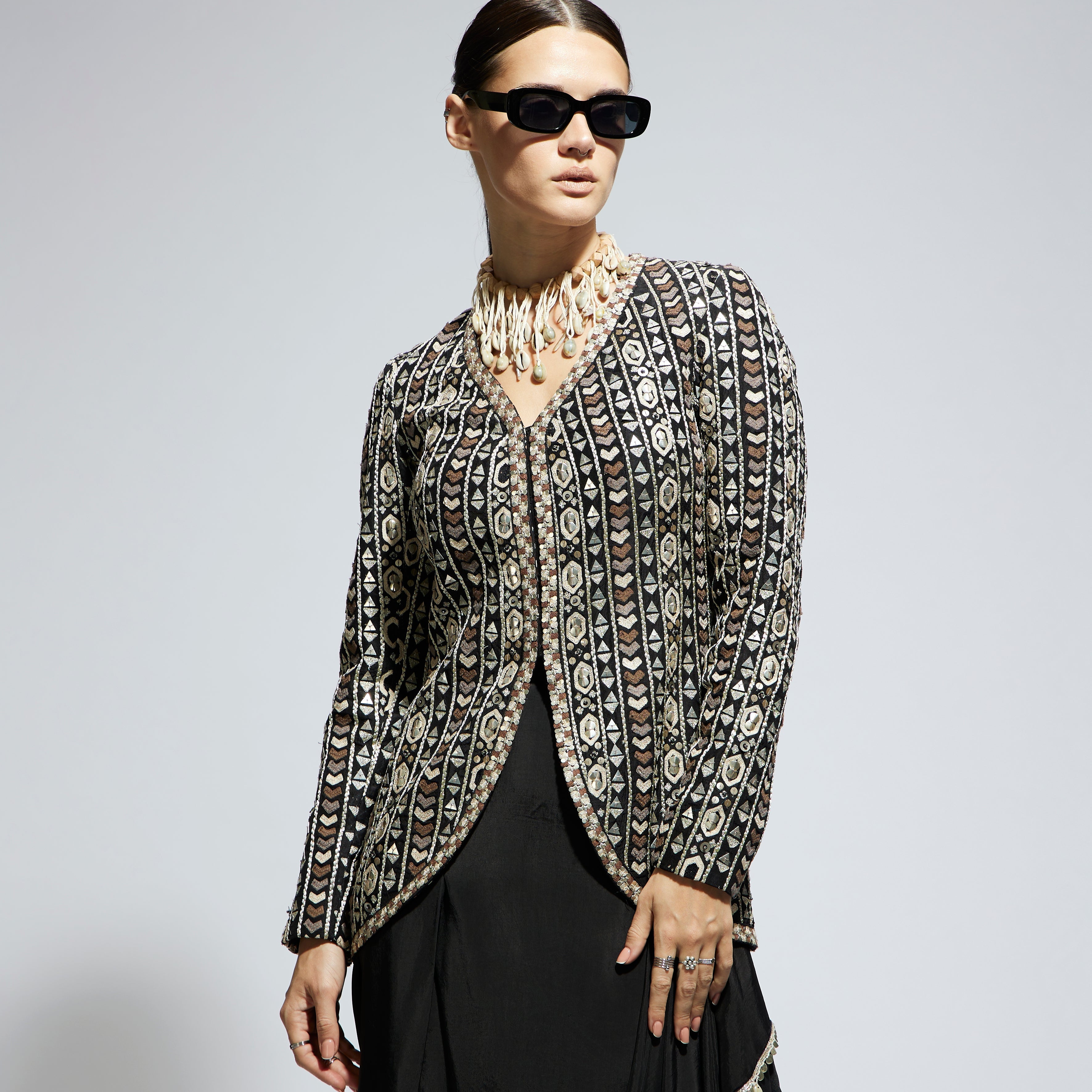 SAMSARA: BLACK EMBELLISHED JACKET PAIRED WITH DRAPE SKIRT