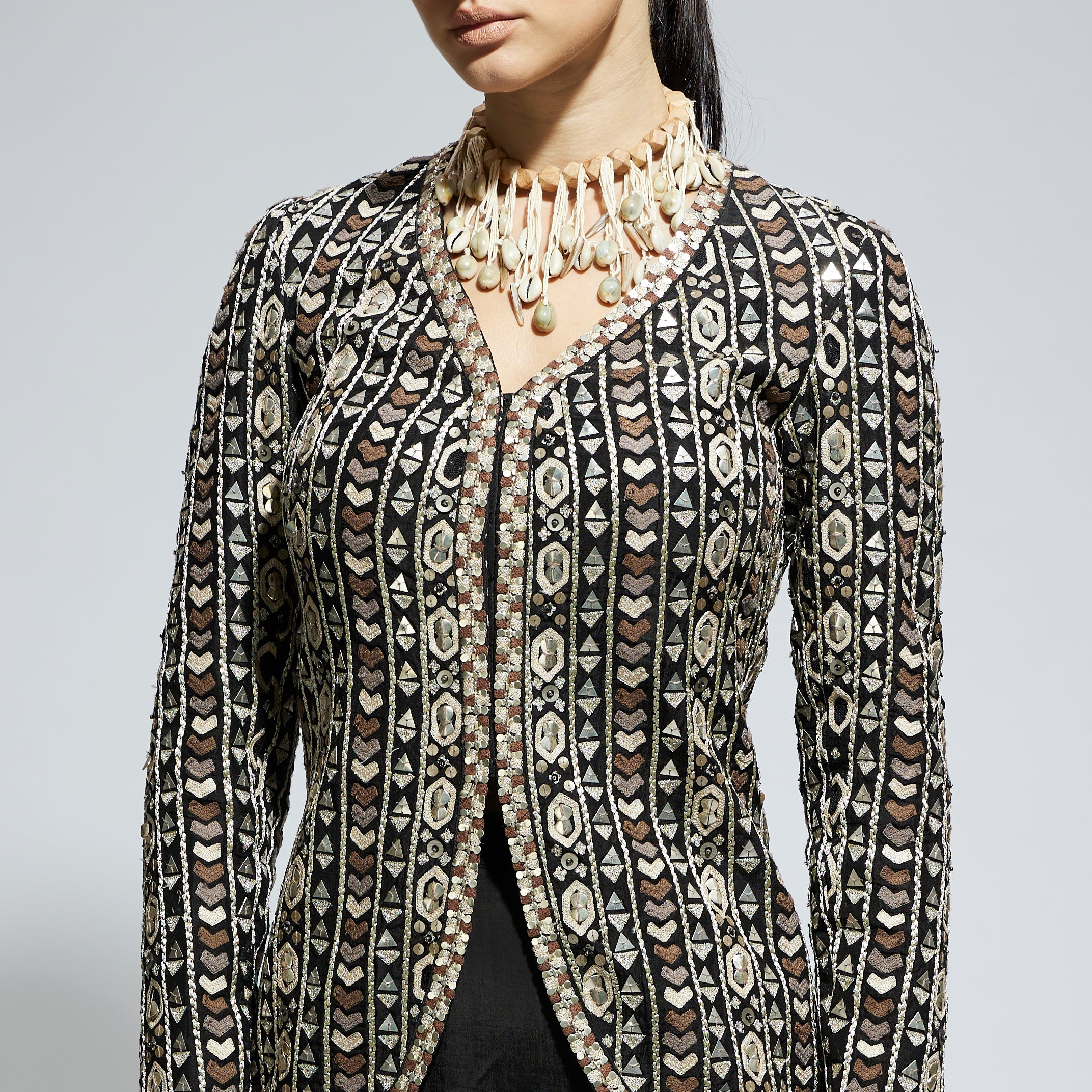 SAMSARA: BLACK EMBELLISHED JACKET PAIRED WITH DRAPE SKIRT