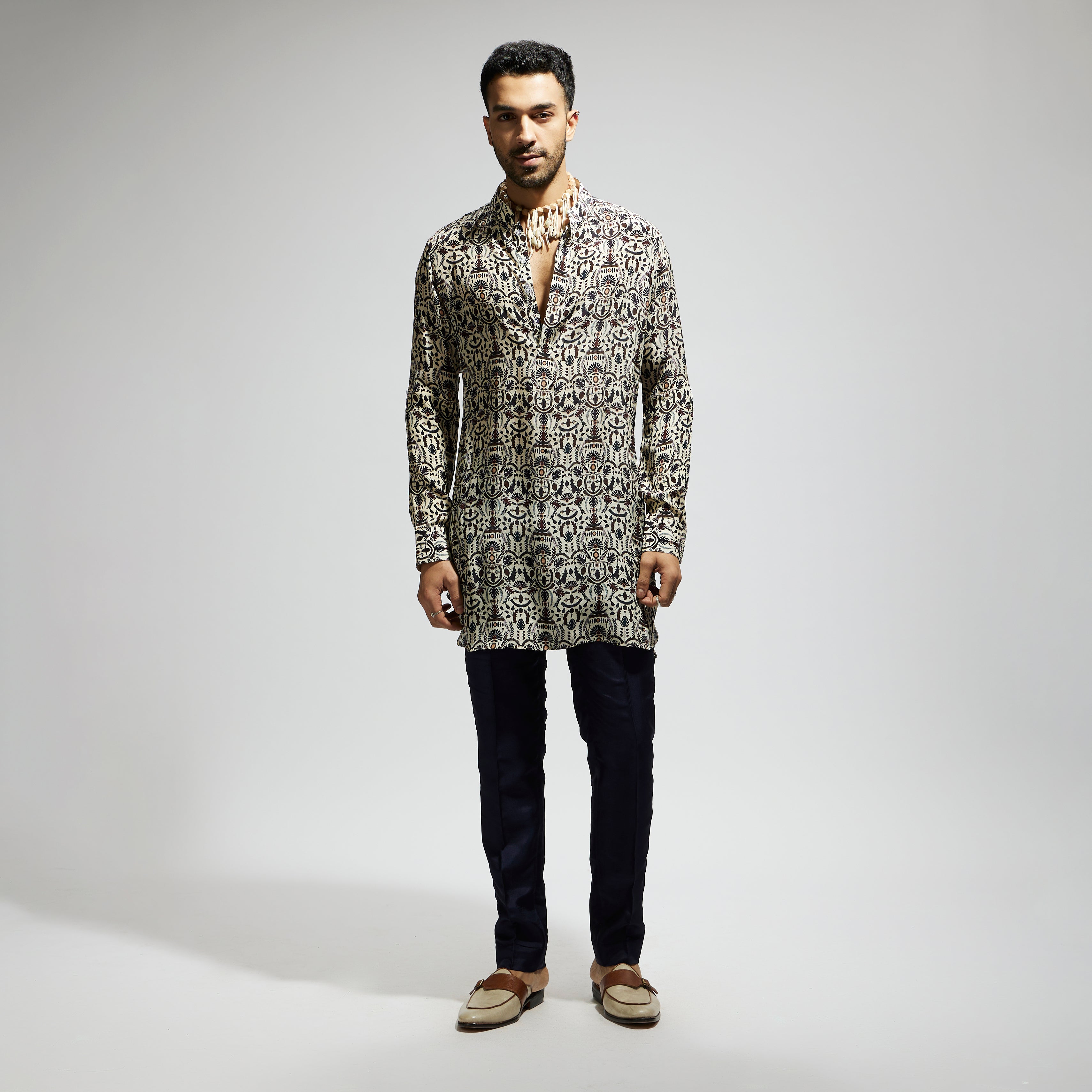 SAMSARA: WHITE LEAF JAAL PRINT ROLLED UP SLEEVES KURTA