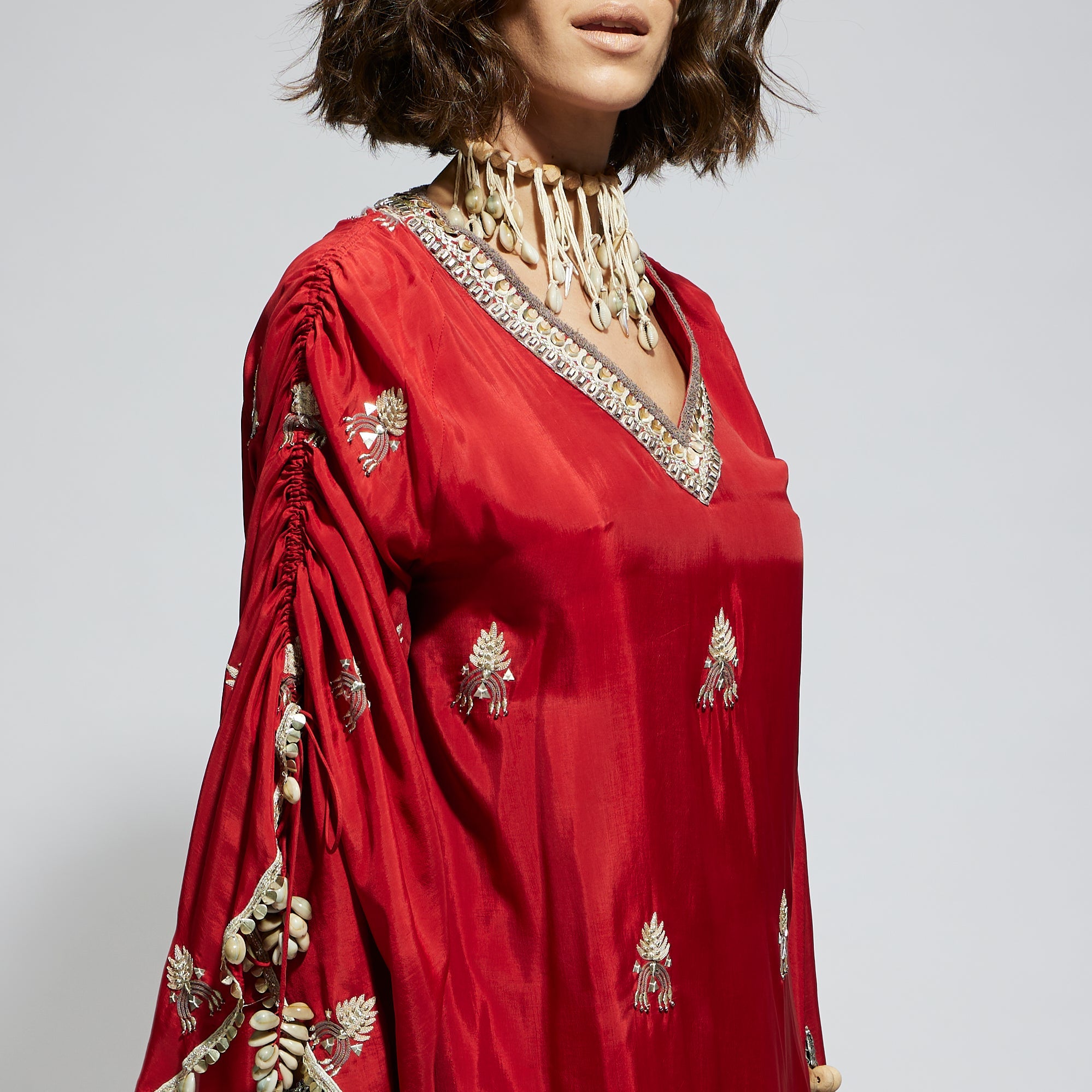 SAMSARA: TERRACOTTA EMBELLISHED CAPE TOP PAIRED WITH TERRACOTTA DRAPE SKIRT