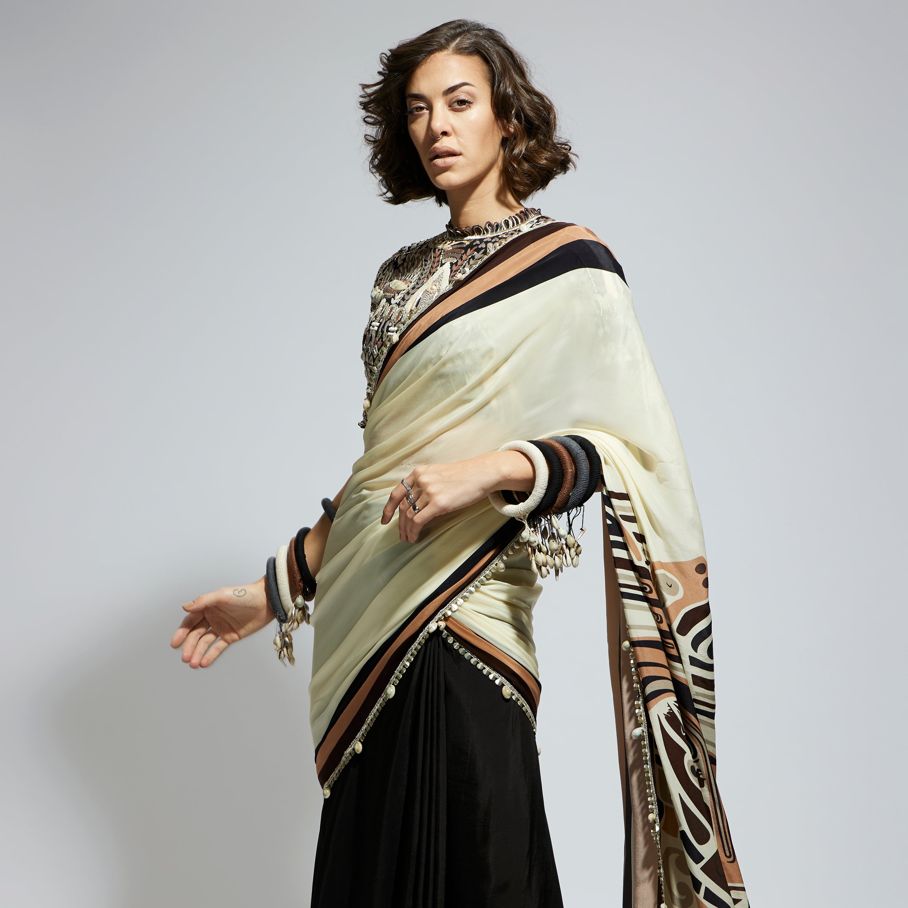 COLOR BLOCK MASK PRINT CASCADE SARI PAIRED WITH BLACK ABSTRACT EMBELLISHED BLOUSE