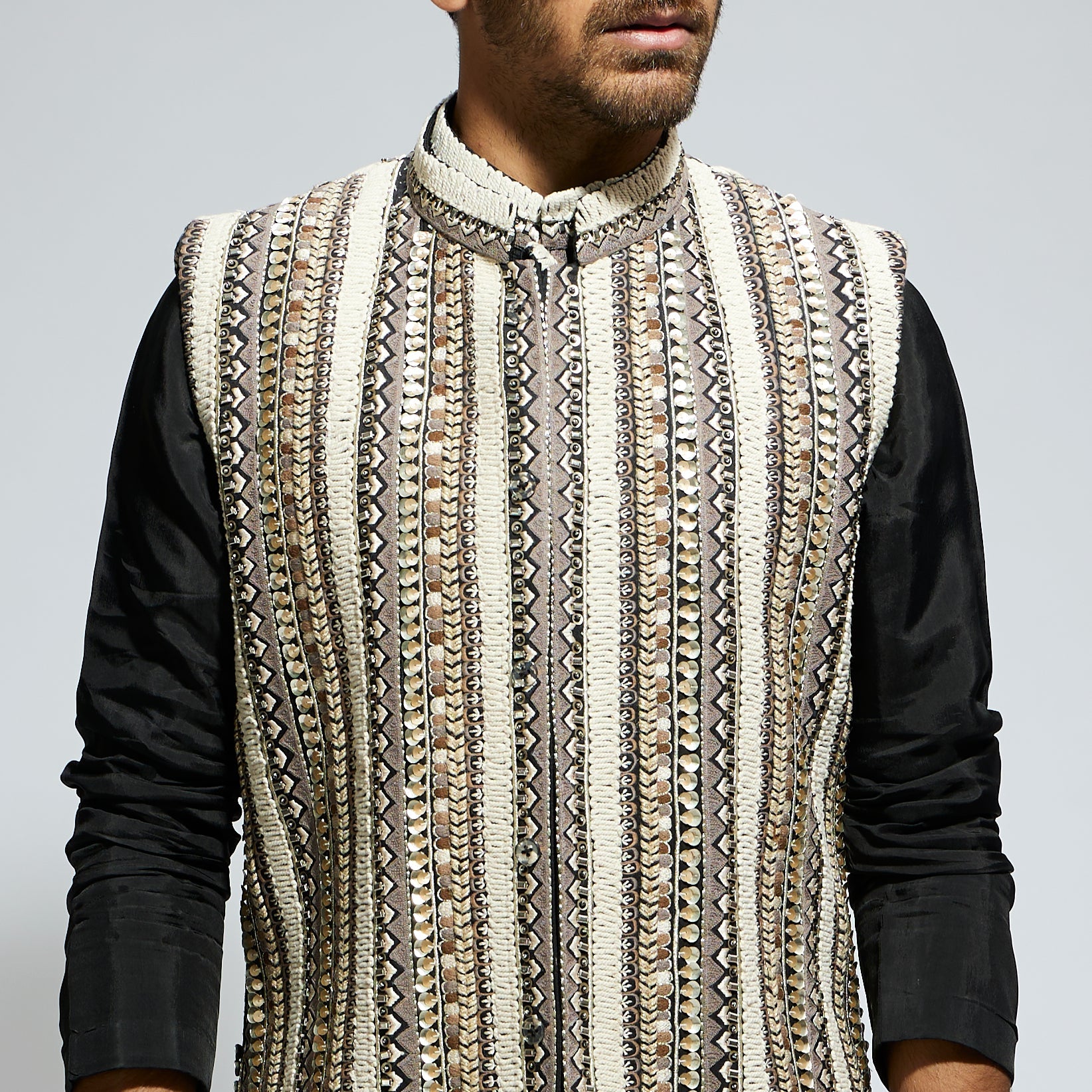 SAMSARA: IVORY THREADWORK EMBELLISHED BUNDI PAIRED WITH KURTA AND PANTS