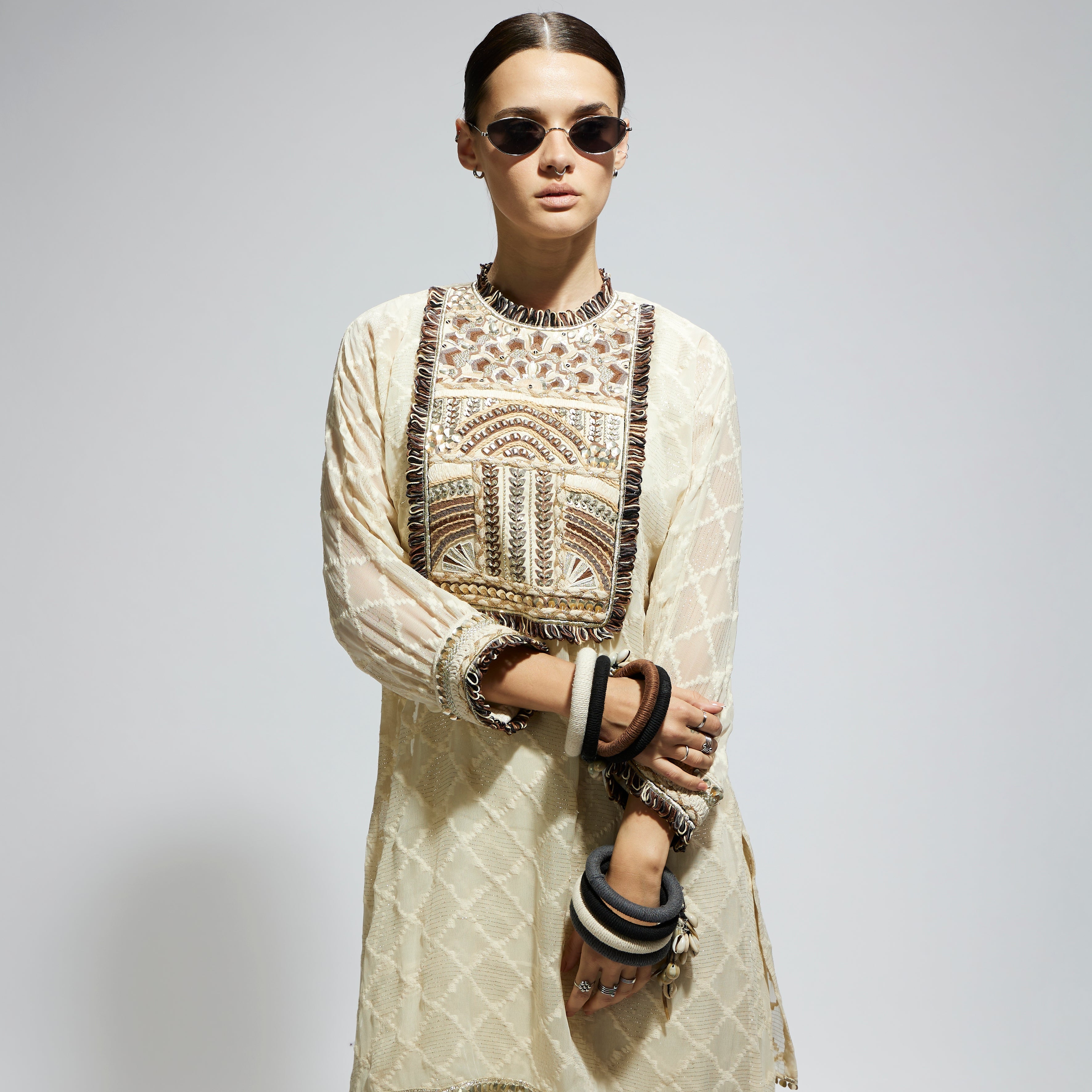 SAMSARA: IVORY AZTEC YOKE EMBROIDERED TUNIC PAIRED WITH DRAPE SKIRT