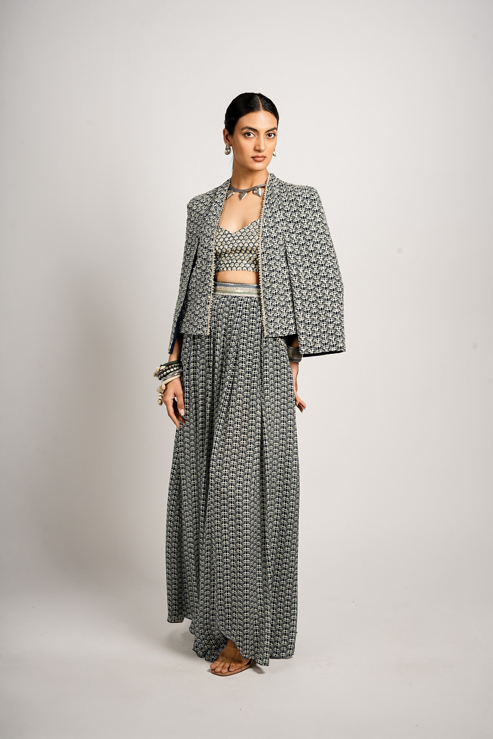MEHRA CAPE JACKET WITH PLEATED PANTS AND BUSTIER