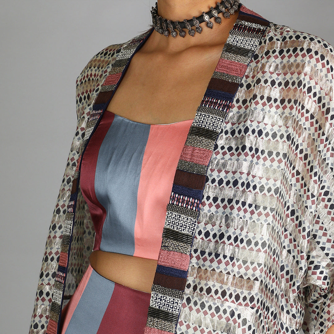 Stripe Print Bustier And Drape Skirt Paired With Jaali Print Chanderi Cape