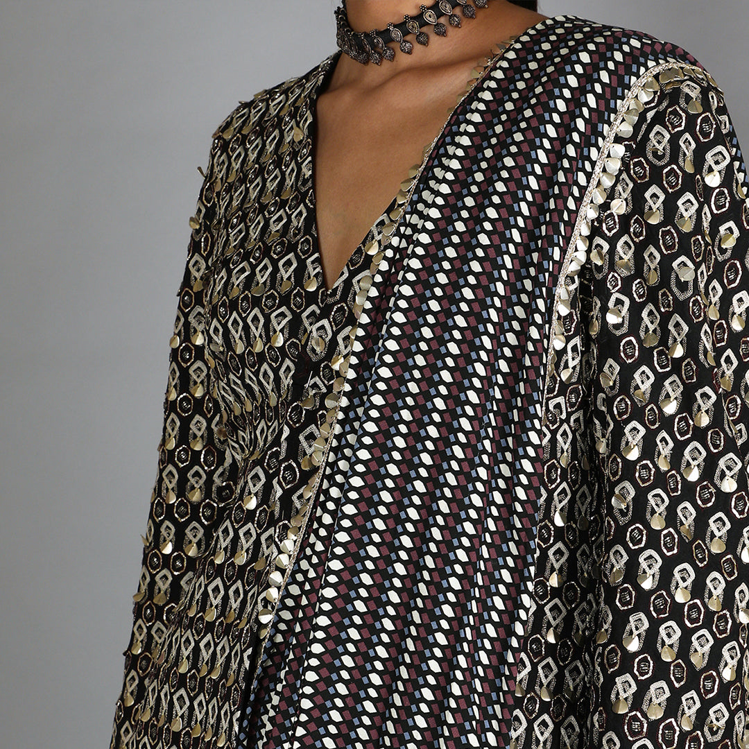 Black Jaali Print Drape Skirt With Attached Drape Paired With Black Embellished Jacket