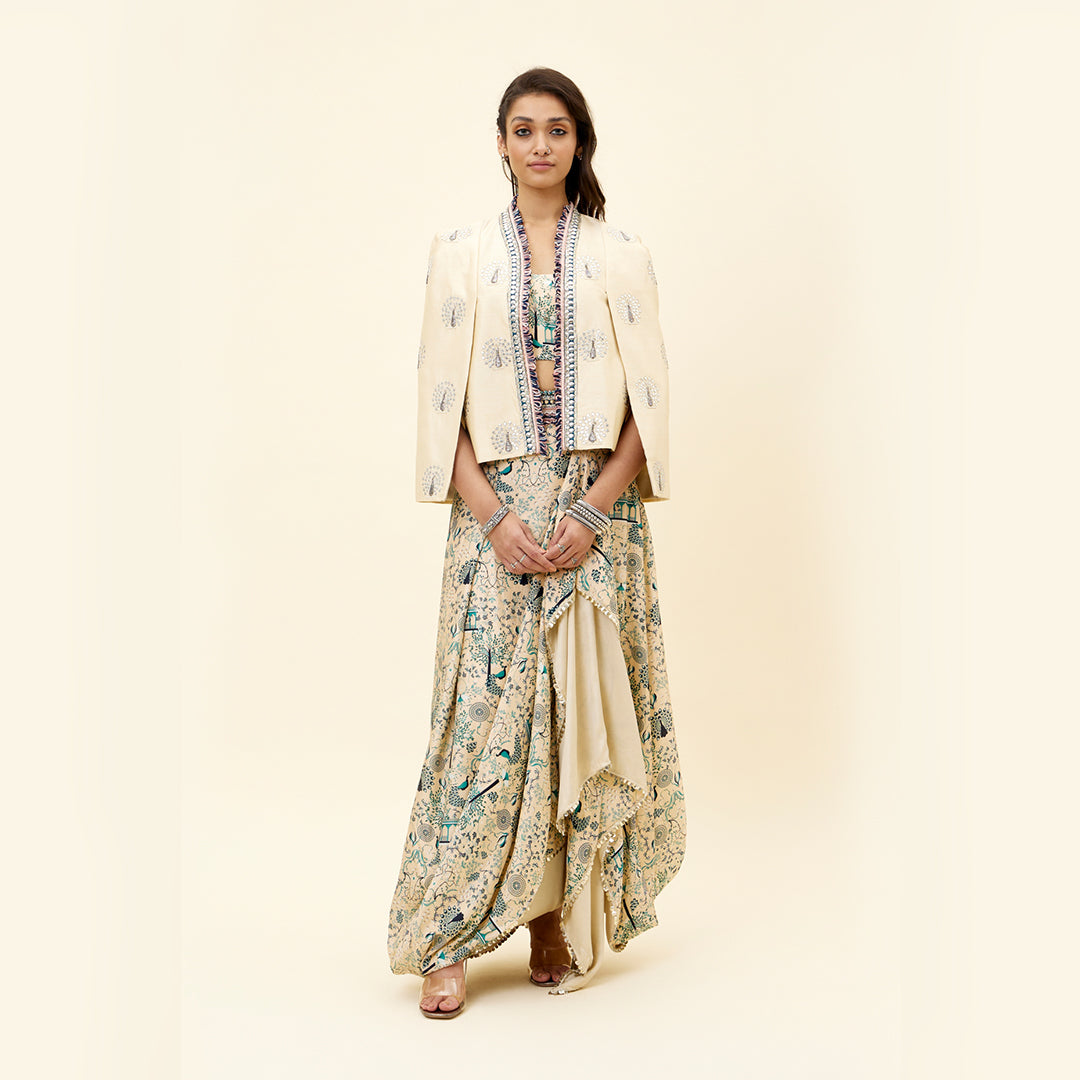 BEIGE MOR JAAL PRINT  NUSRAT DRAPED SKIRT AND BUSTIER TEAMED WITH A SIGNATURE  STRUCTURED CAPE JACKET