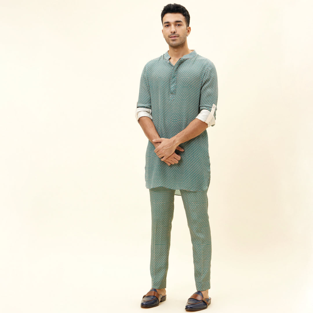 BEIGE BUTTI PRINT SHORT SHIRT STYLE KURTA WITH ROLLED UP SLEEVES WITH BEIGE BUTTI PRINT PANTS
