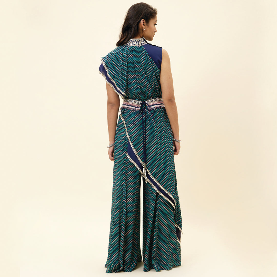 BLUE CROP TOP WITH BLUE BUTTI PRINT DRAPE AND BLUE SOLID PLAIN SILK DRAPE WITH BLUE BUTTI PRINT SHARARA PANTS AND EMB BELT