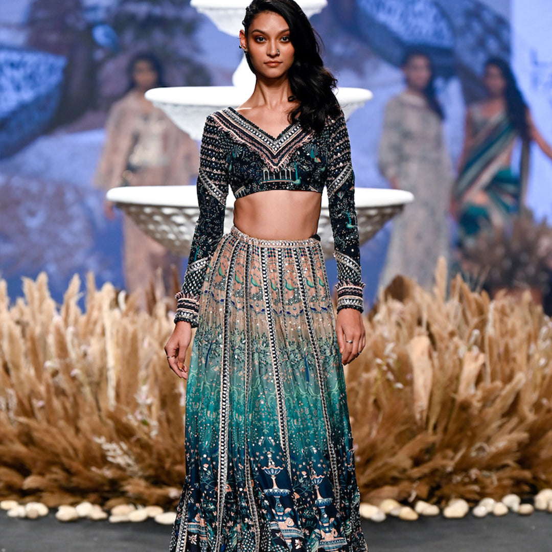 OMBRÉ MOR FUAARA PRINTED EMBELIISHED LEHNGA TEAMED WITH A PATCHWORK FULL SLEEVE BLOUSE