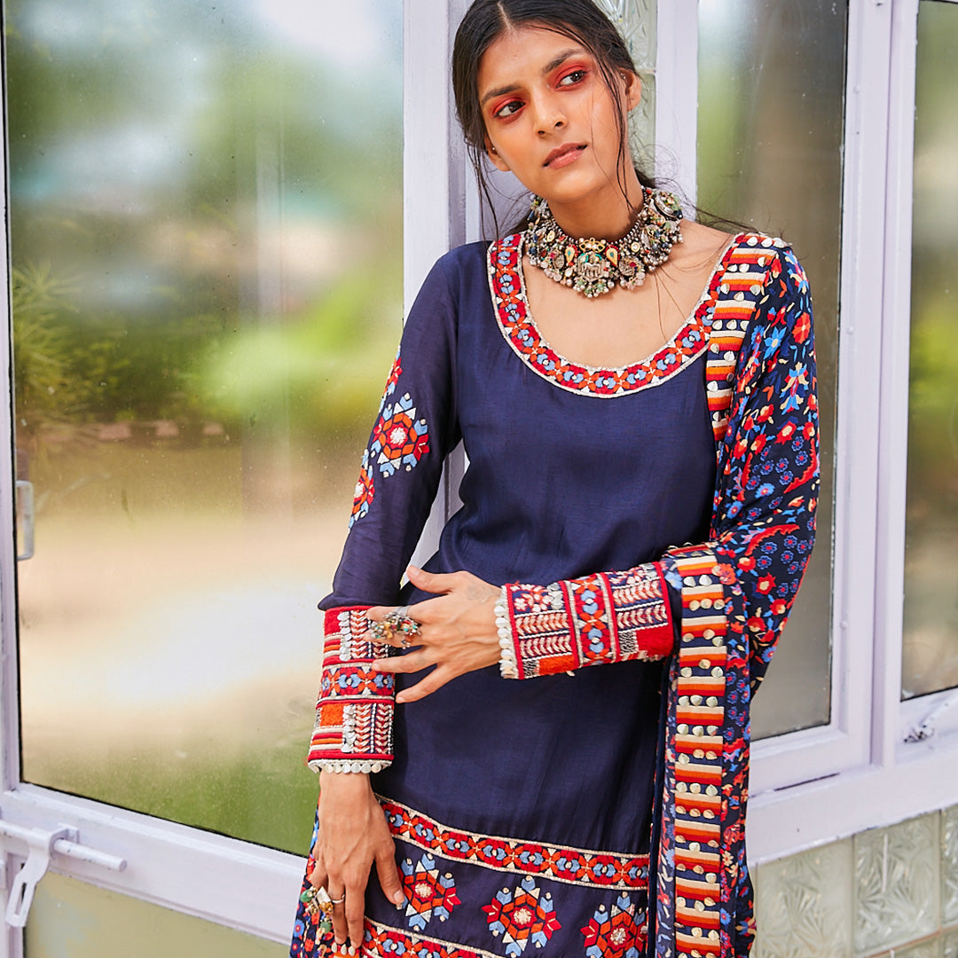 BLUE HEAVY EMBROIDERED KURTA WITH SHARARA AND BLUE JAAL PRIT BUPATTA